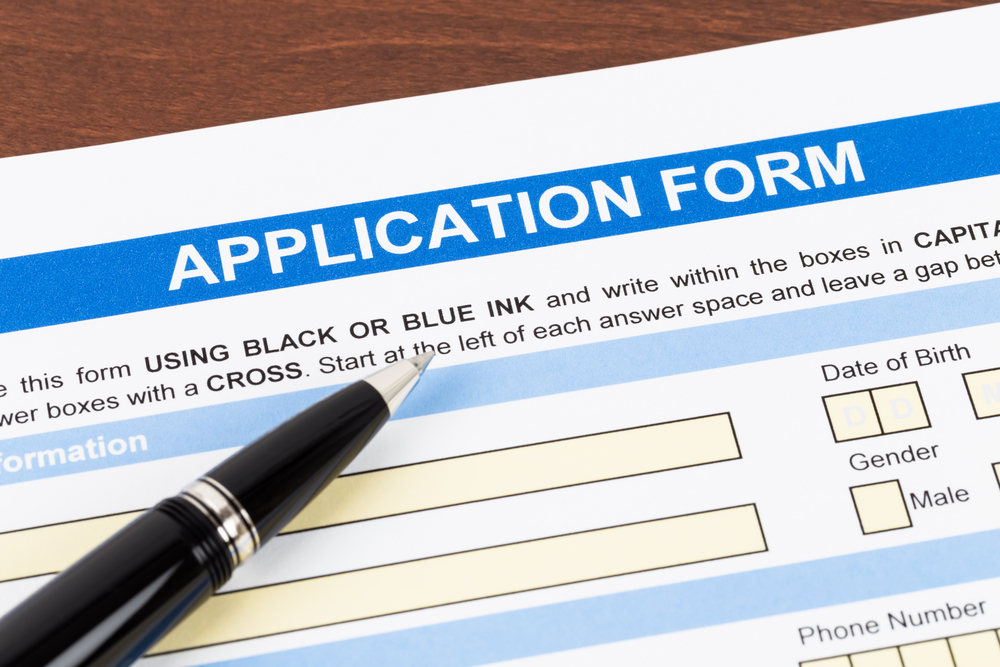 Application,form,with,pen;,document,is,mock Up